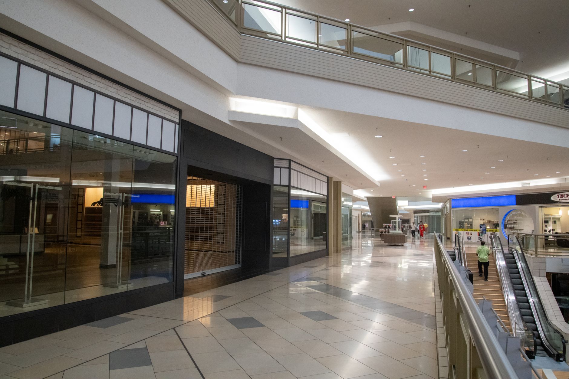 Row of retail storefronts in a suburban strip mall