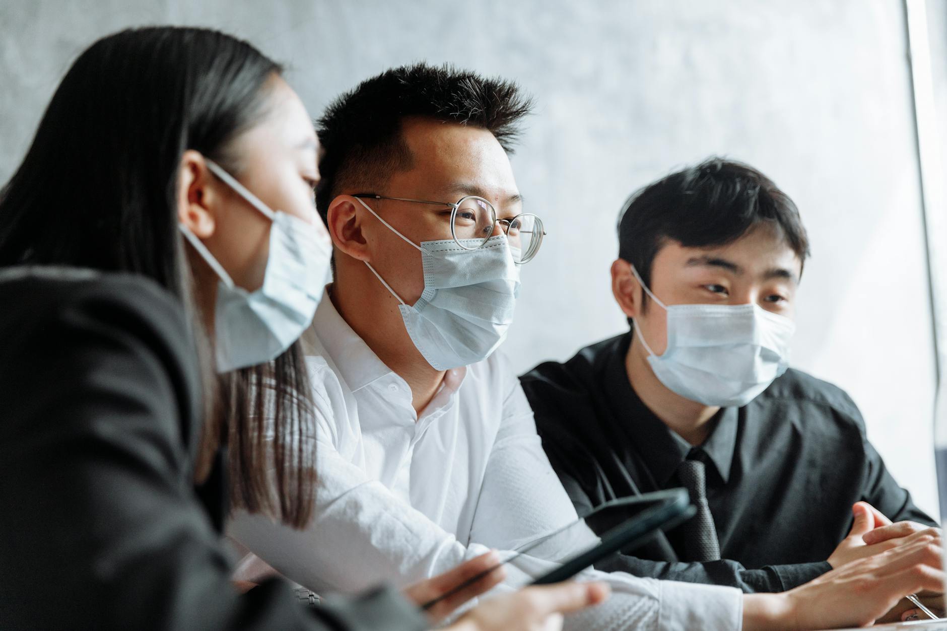 Employee speaking with a nurse at an on-site employer health clinic
