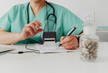A medical billing office with staff working at computers on insurance documentation
