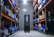 Interior of a medical supply warehouse with shelving units stocked with healthcare equipment and supplies