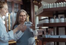 Pharmacy shelves stocked with medication bottles representing hospice drug supply logistics