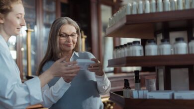 Pharmacy shelves stocked with medication bottles representing hospice drug supply logistics