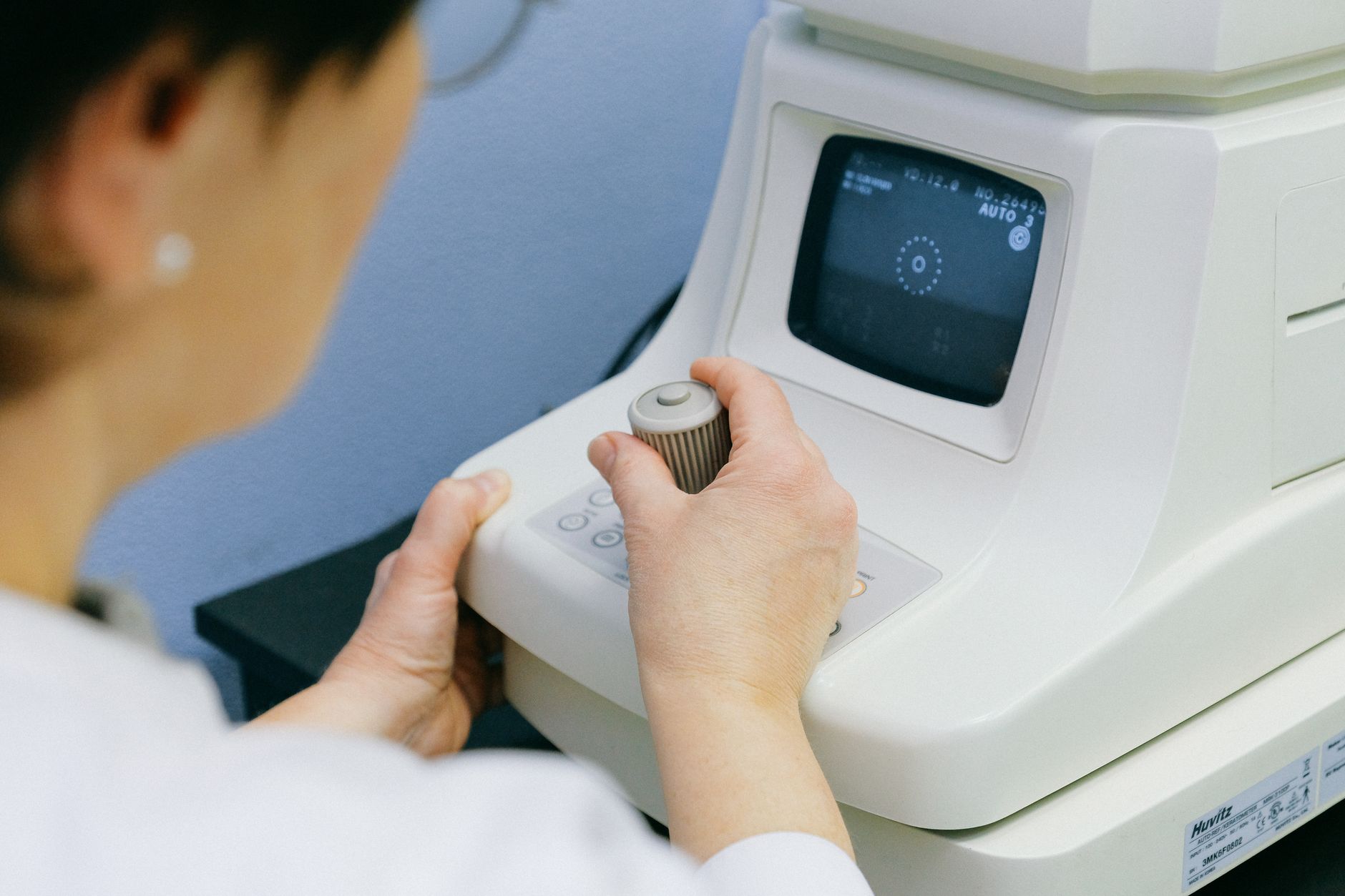 Patient receiving an eye examination at an ophthalmology clinic