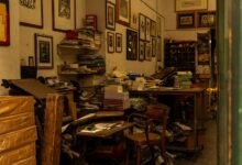 Interior of a commercial printing shop with large format printing equipment
