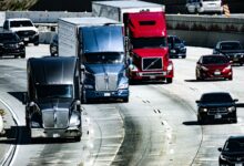 A freight truck driving on an open highway representing regional shipping logistics