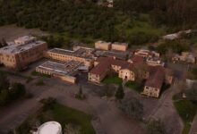 Small rural hospital building exterior in a remote community setting