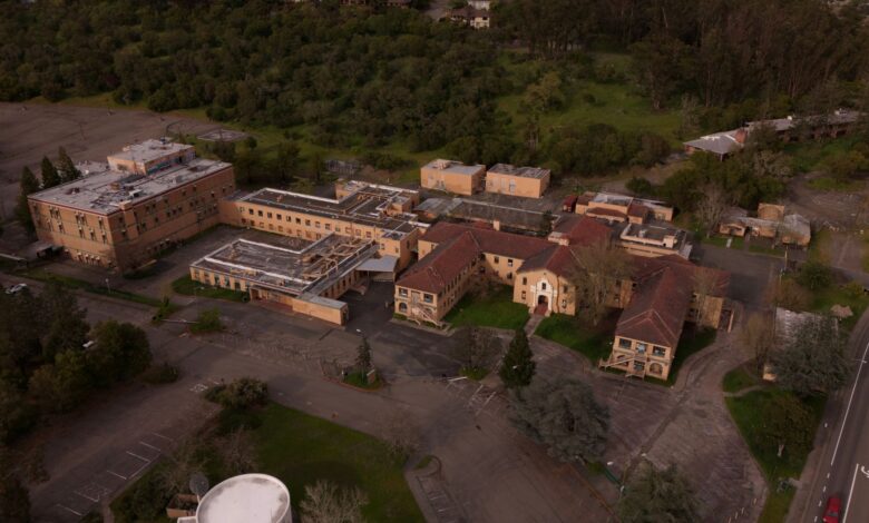 Small rural hospital building exterior in a remote community setting