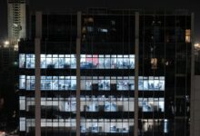 Commercial real estate appraisal documents on a desk in an office setting