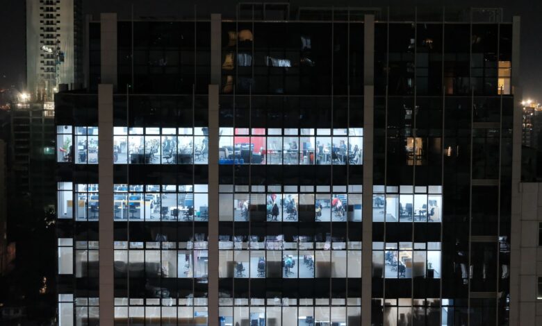 Commercial real estate appraisal documents on a desk in an office setting