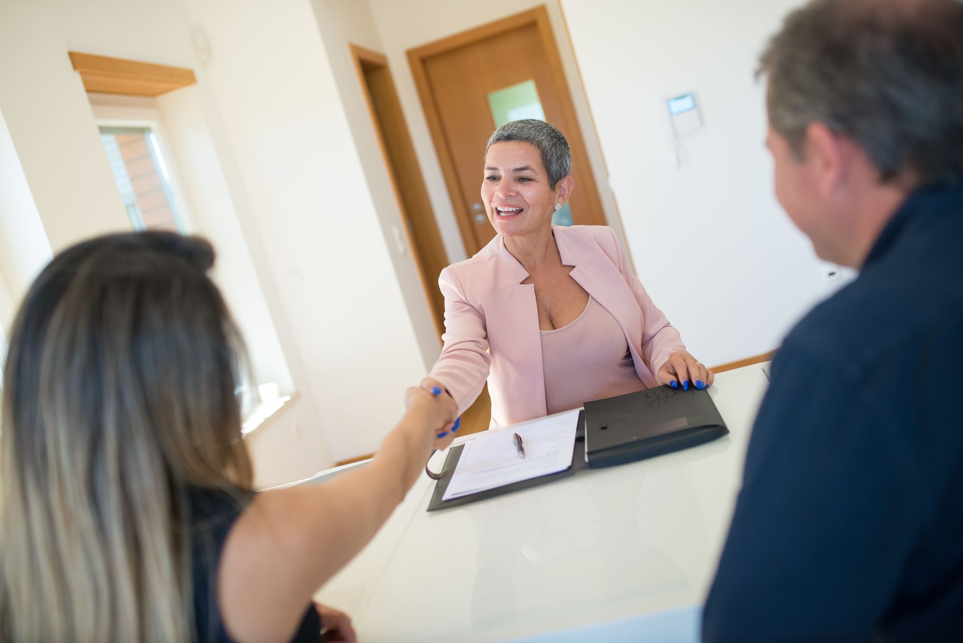 CPA firm professional meeting with a client to discuss financial documents