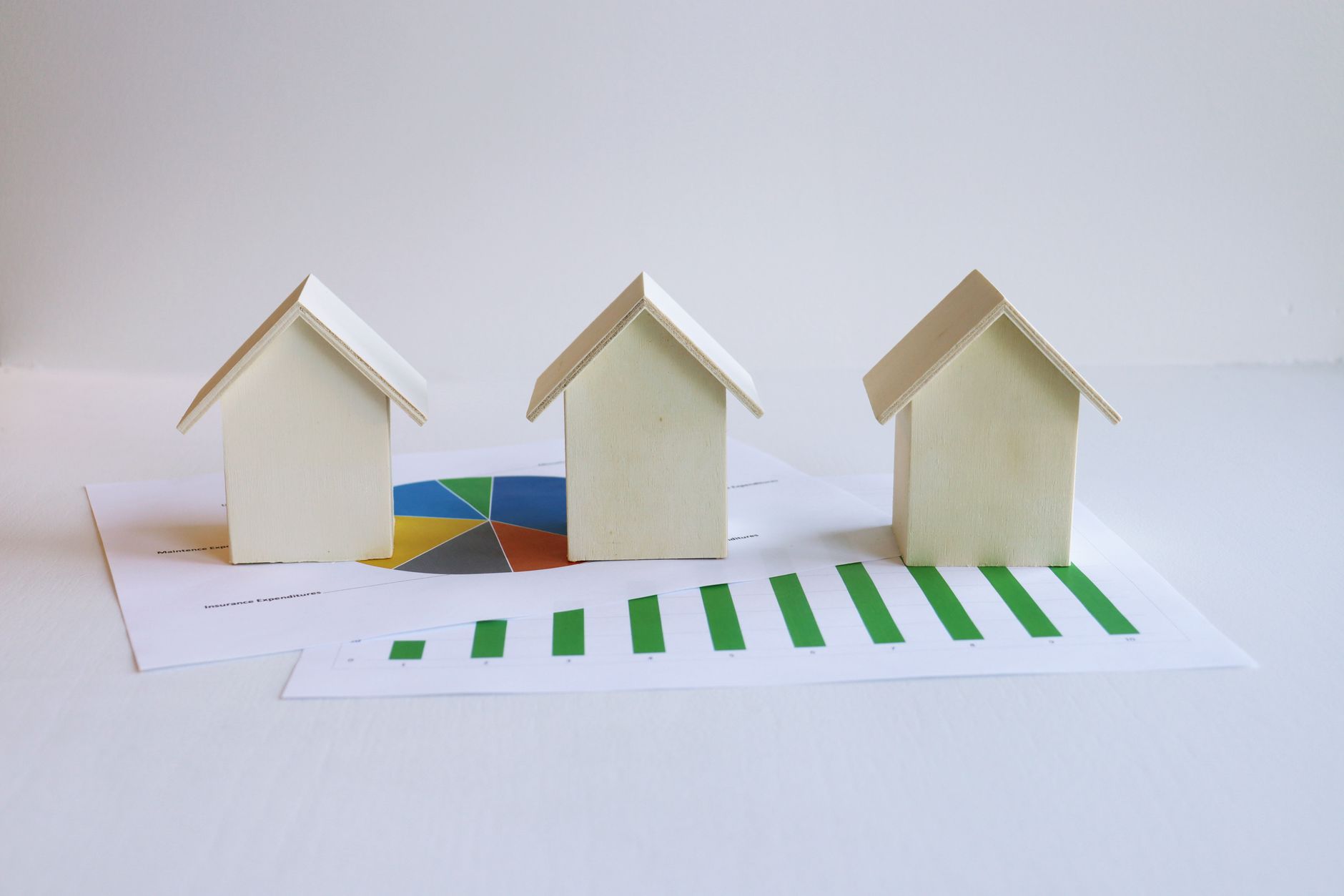 Business professional using digital tools to analyze property and real estate information