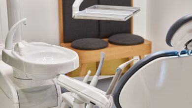 Modern oral surgery office with dental chair and surgical equipment