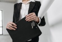 Paperwork and keys on a desk representing a real estate closing transaction