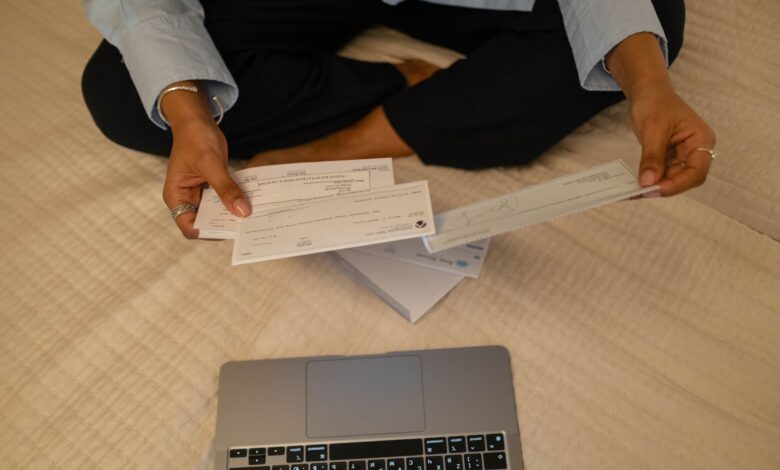 Healthcare billing documents spread across a desk representing hospice contract administration