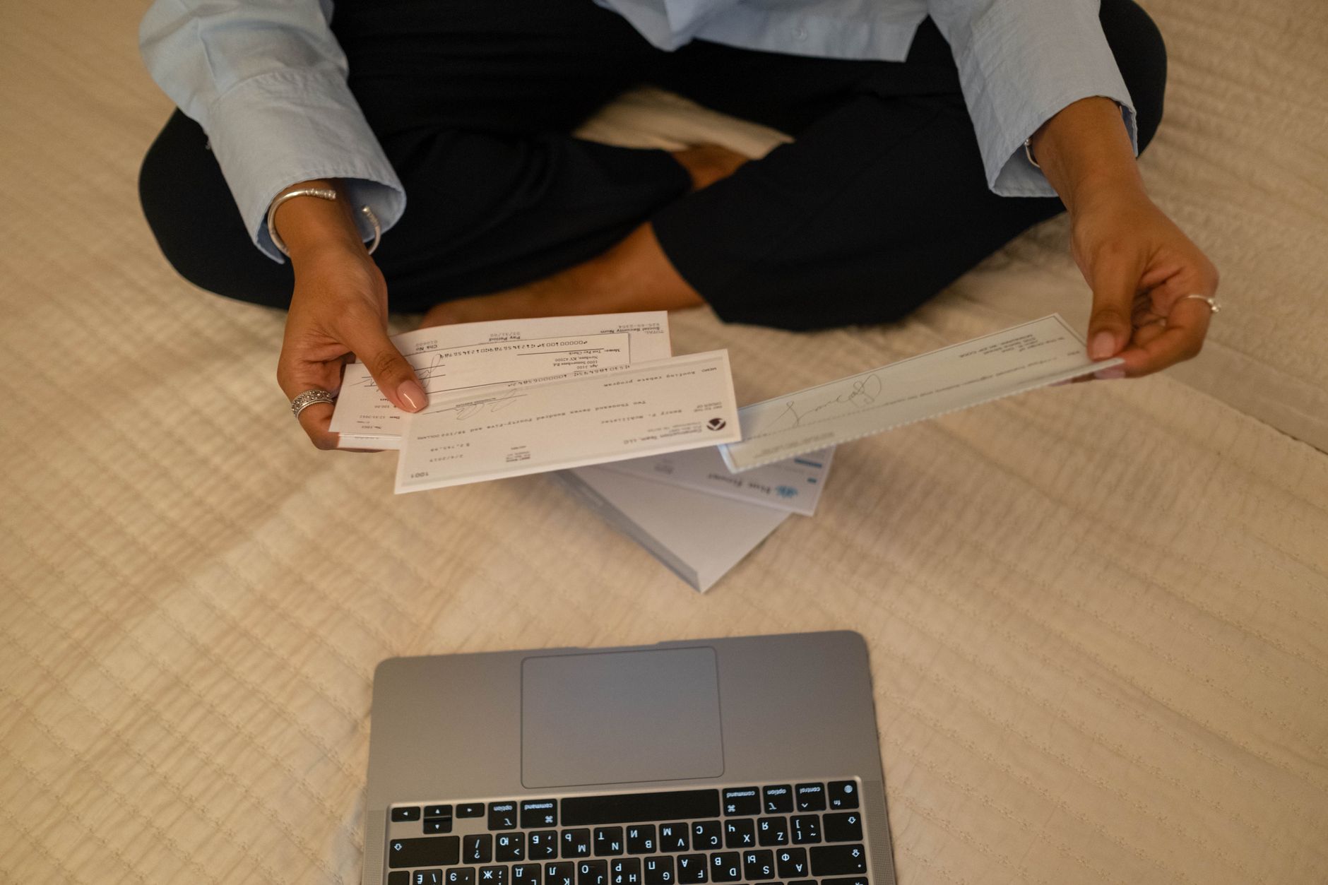 Healthcare billing documents spread across a desk representing hospice contract administration