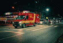 An ambulance parked on a city street representing emergency medical services