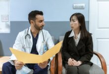 A physician consulting with a patient in a private practice office setting