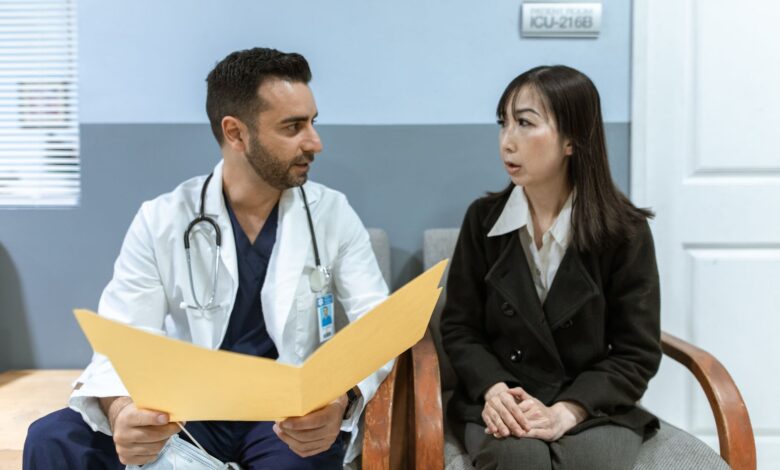 A physician consulting with a patient in a private practice office setting