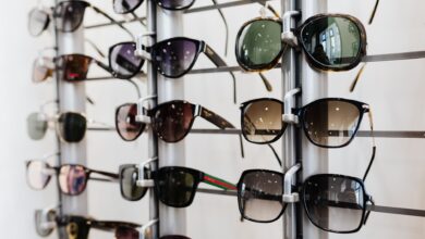 Interior of an optical retail store with eyeglass frames displayed on shelves