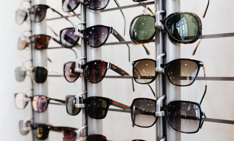Interior of an optical retail store with eyeglass frames displayed on shelves