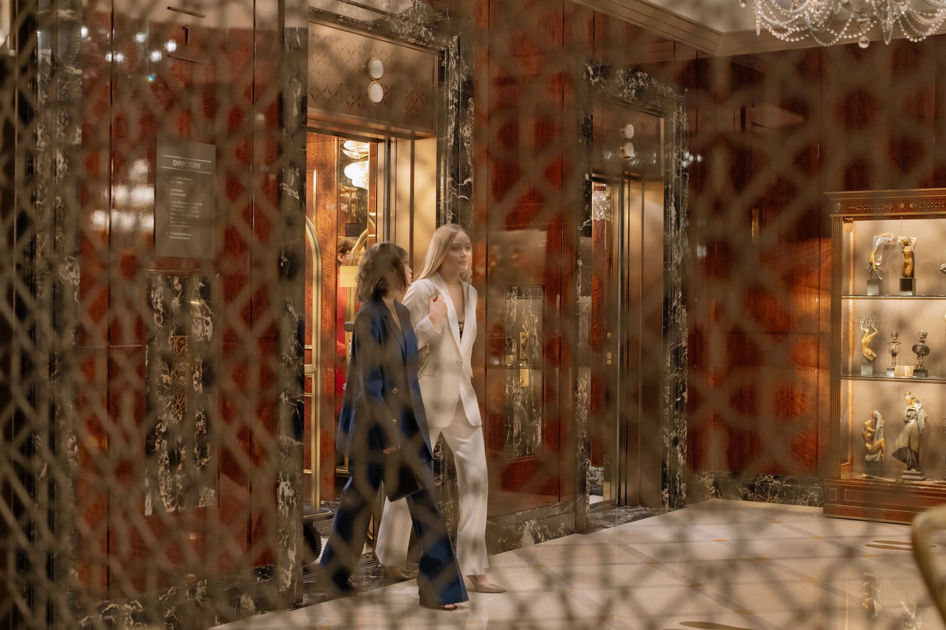 Modern elevator interior with stainless steel doors and control panel
