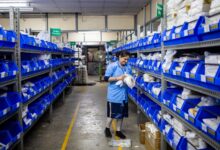 Medical supply warehouse with dialysis equipment on shelving units