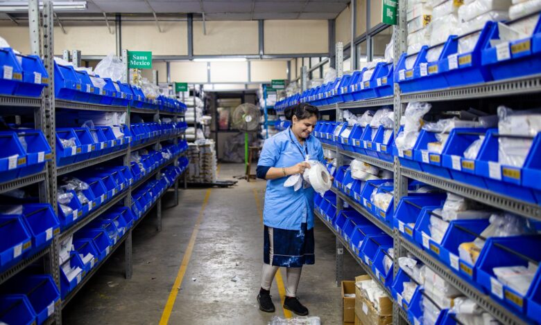 Medical supply warehouse with dialysis equipment on shelving units