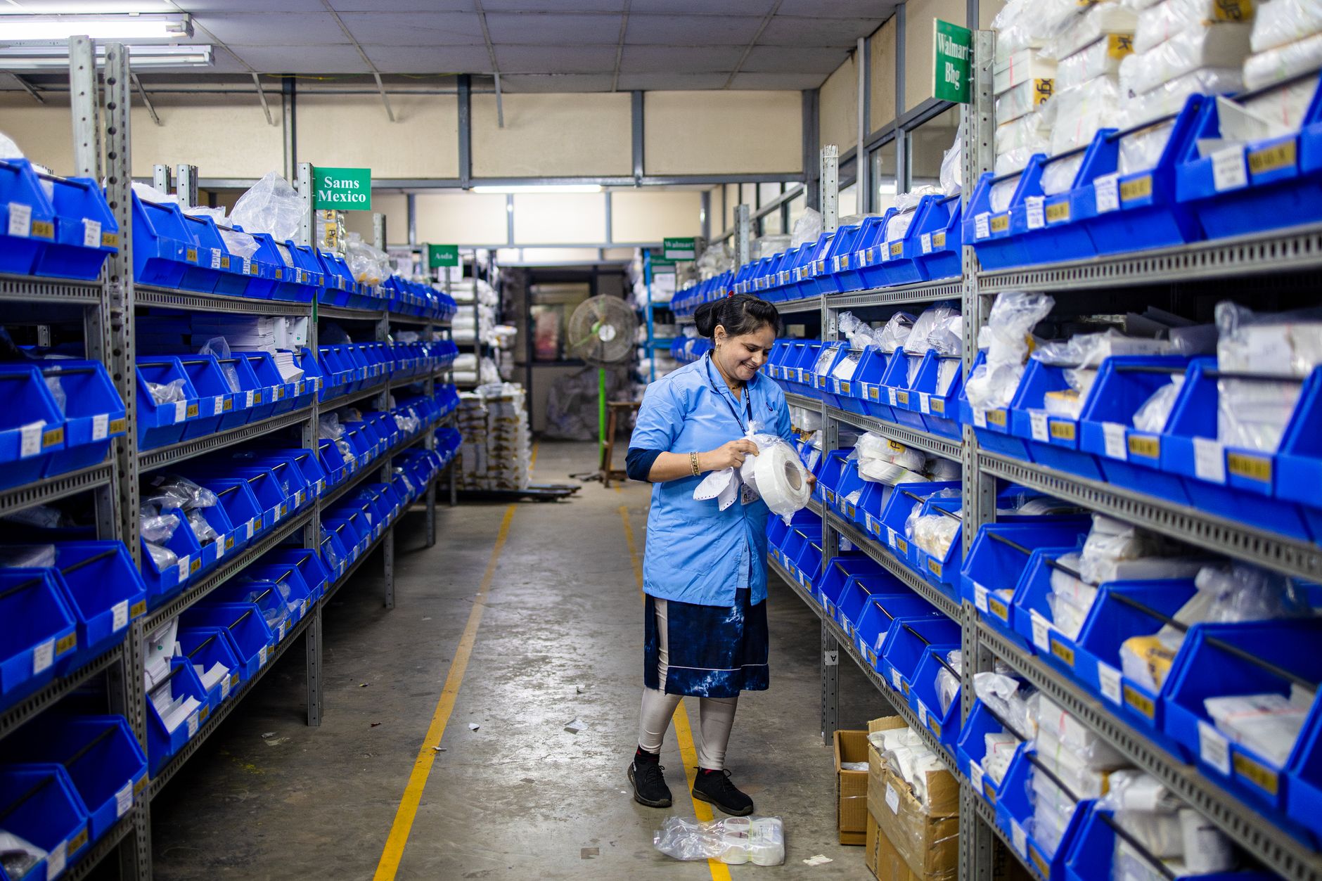 Medical supply warehouse with dialysis equipment on shelving units