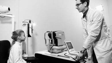 A patient receiving an eye examination at a modern ophthalmology clinic