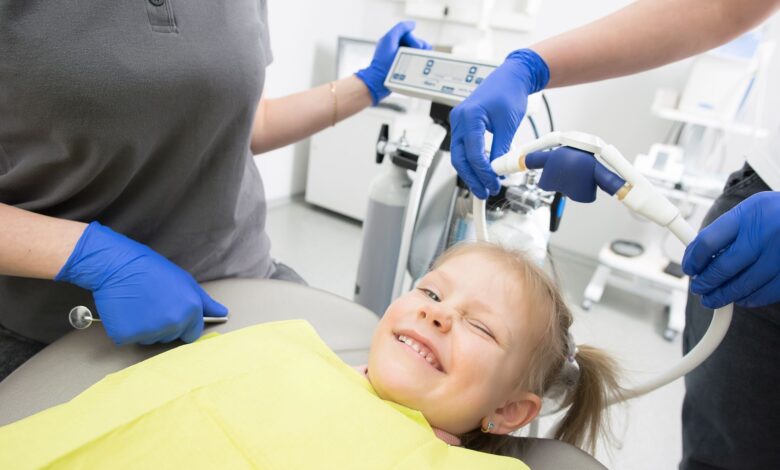 Colorful pediatric dental office waiting room with child-sized chairs