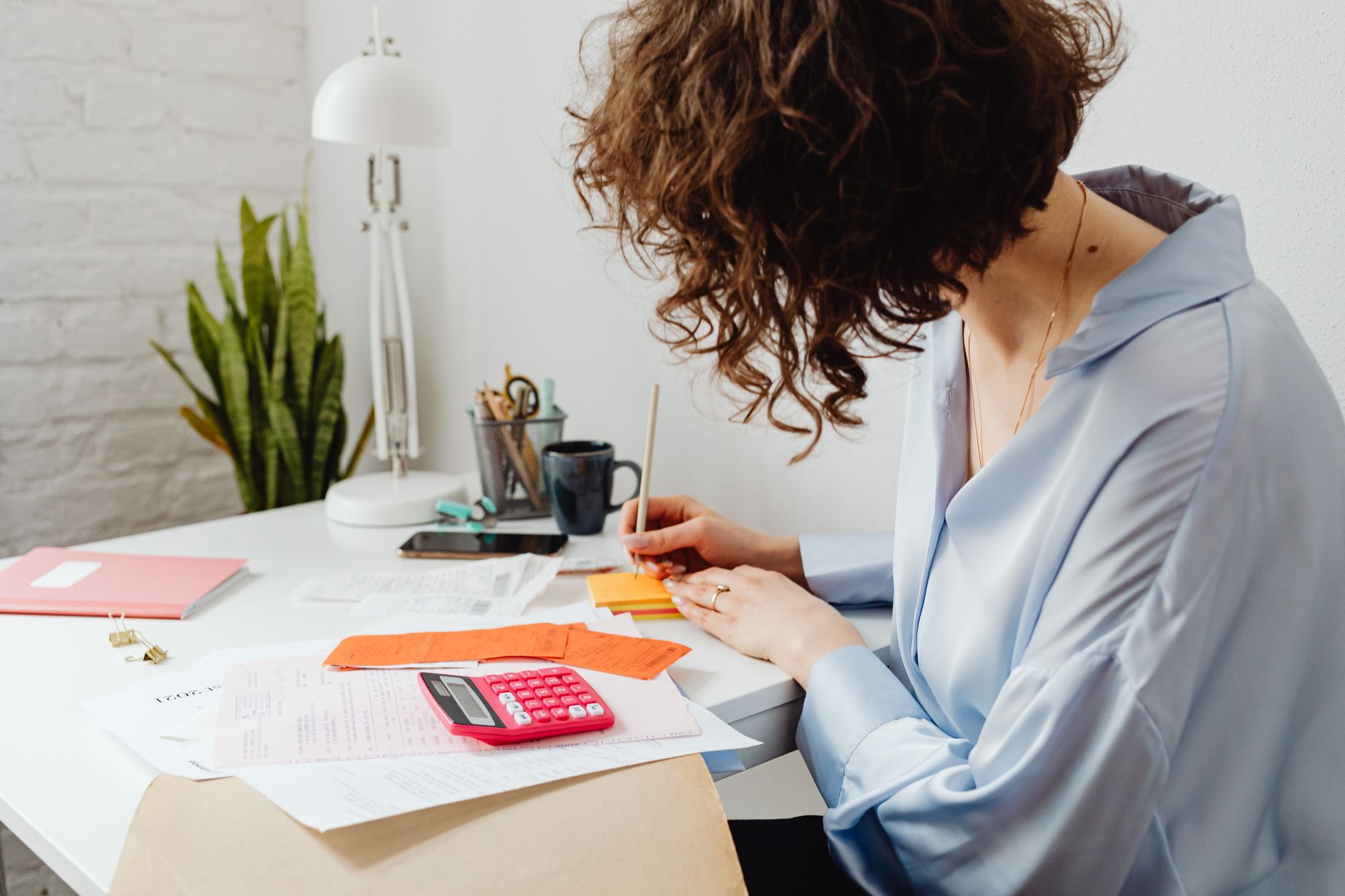 Business finance documents and paperwork on a desk representing invoice factoring and receivables