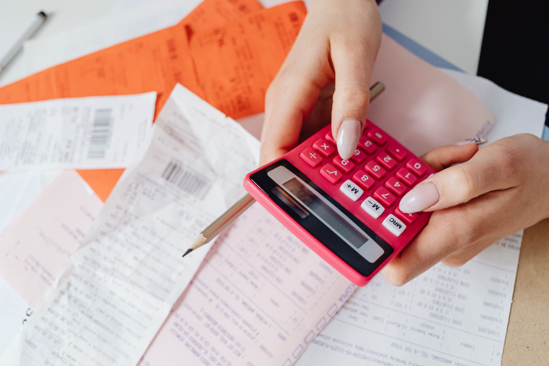 Medical billing documents and paperwork spread on a desk
