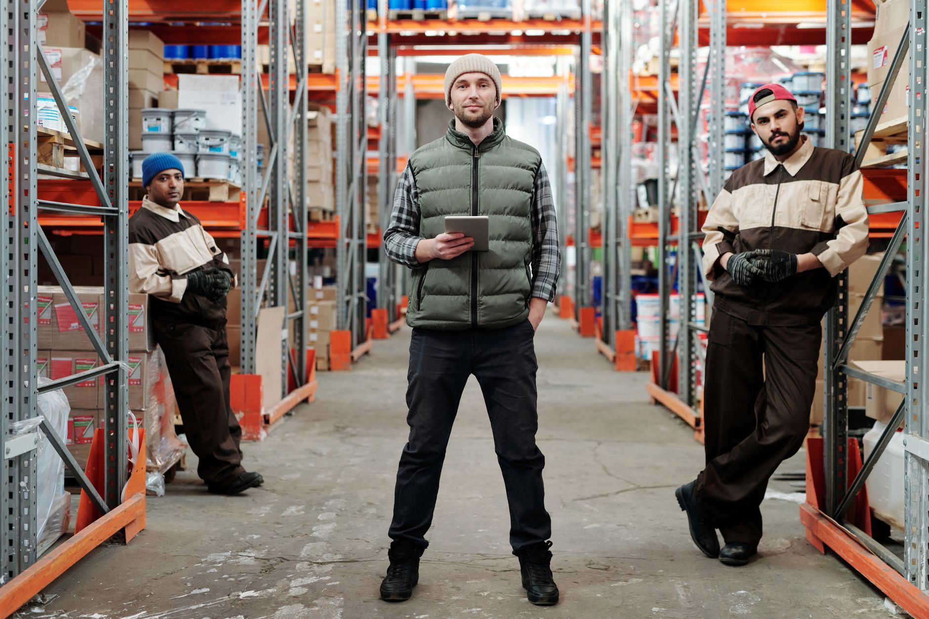 A warehouse worker reviewing shipment details, representing freight management operations