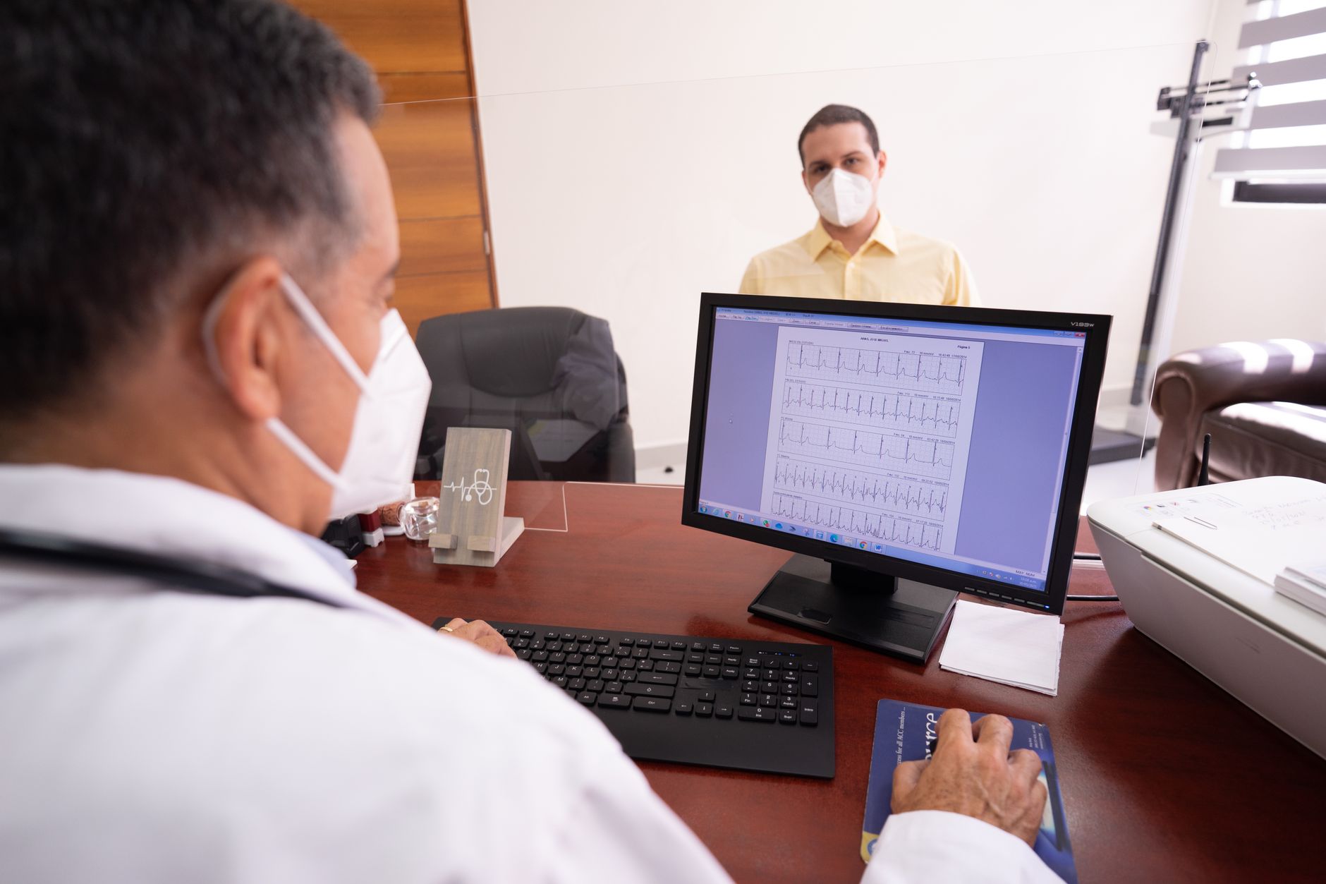 Physician in a private practice office, representing independent medical groups