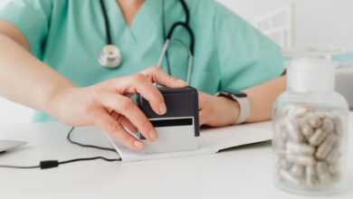 A home health billing office with staff reviewing medical claims at computers