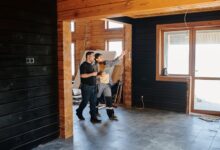 A home inspector examining a property interior during a professional inspection