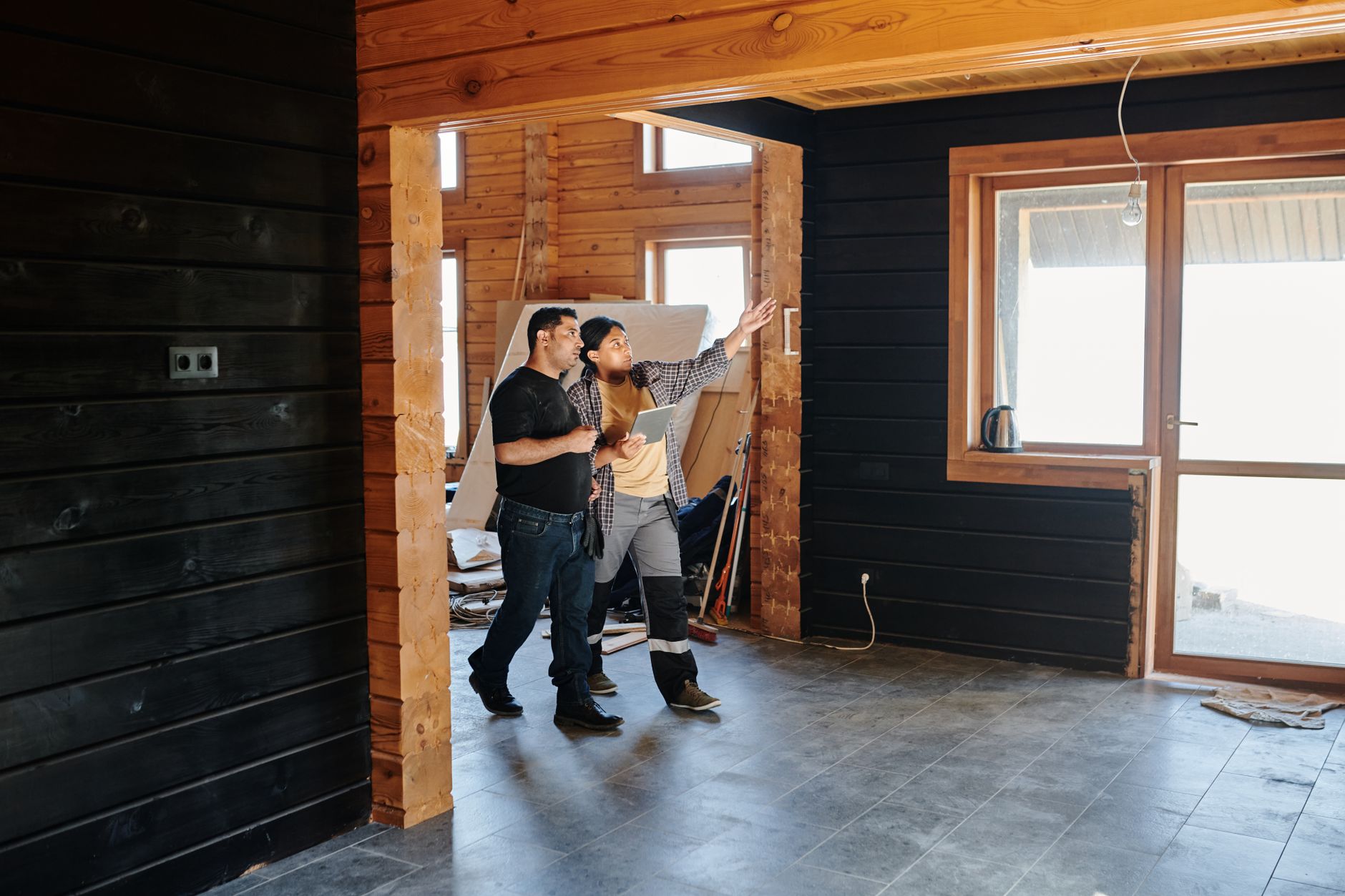 A home inspector examining a property interior during a professional inspection