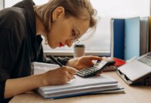 Accountant working at a desk in a regional CPA firm office