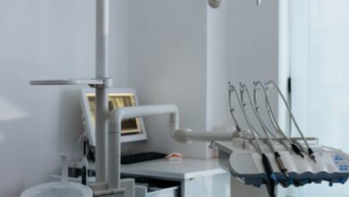 Empty waiting room inside a regional medical clinic with rows of chairs