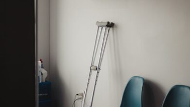 Empty fertility clinic waiting room with soft lighting and chairs