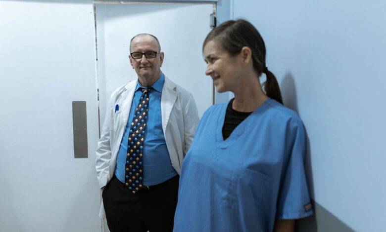Empty hallway inside a medical office building representing a gastroenterology practice setting