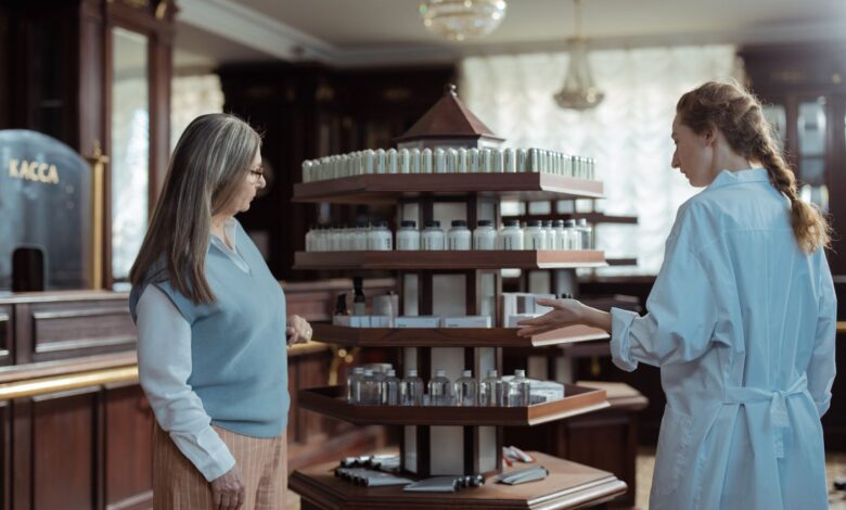 Interior of an independent pharmacy with prescription shelves and dispensing counter