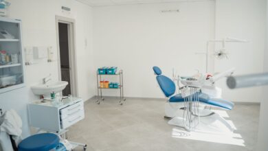 A modern dental or oral surgery office reception area with clean white interior