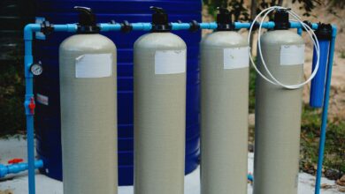 Aerial view of a water treatment facility with circular filtration tanks