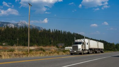 Semi truck driving on a highway representing regional freight transportation