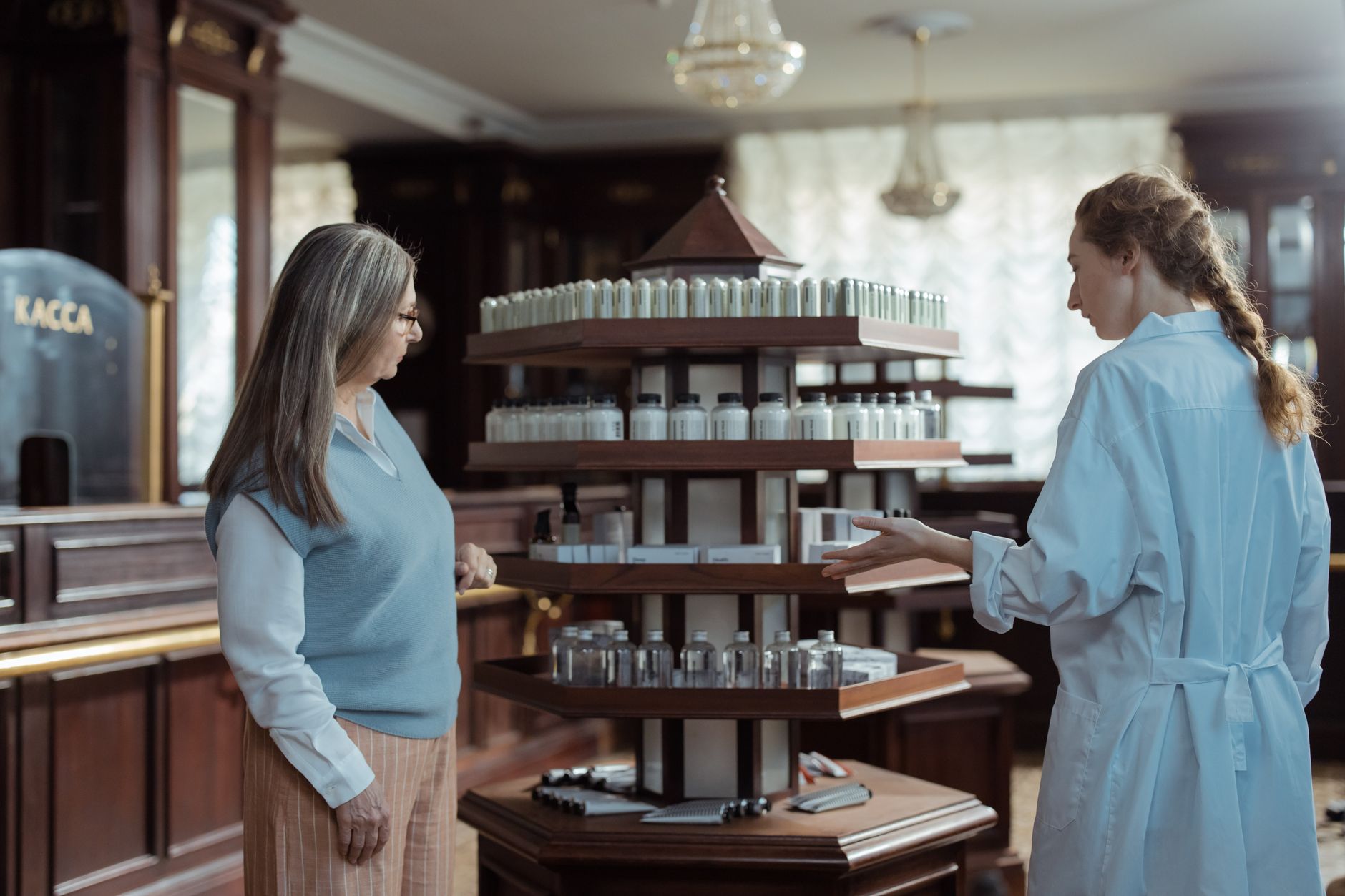 Interior of a compounding pharmacy with shelves of medications and laboratory equipment