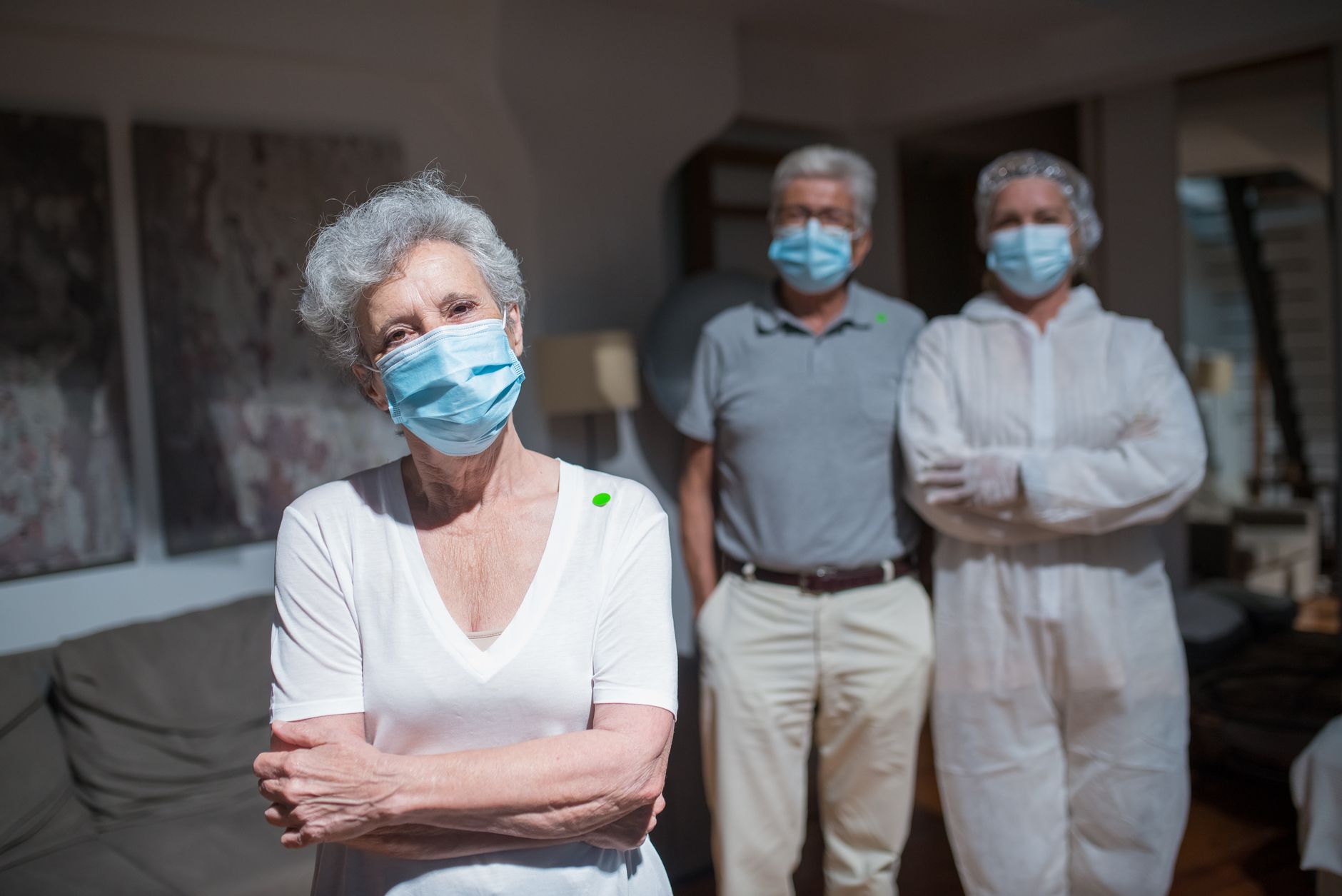 A home health worker with a patient, representing the agencies affected by billing group exits