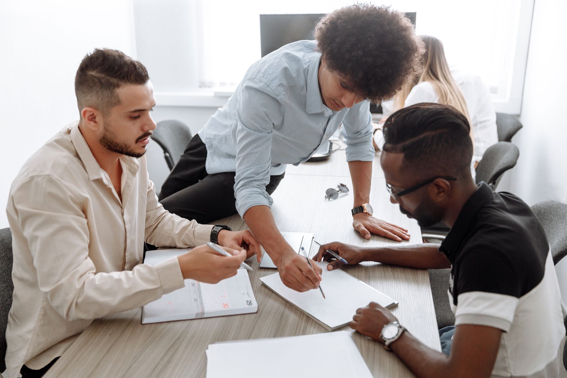 Small business owner meeting with financial advisor in an office setting