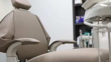 Interior of a modern medical clinic waiting room with seating and reception desk
