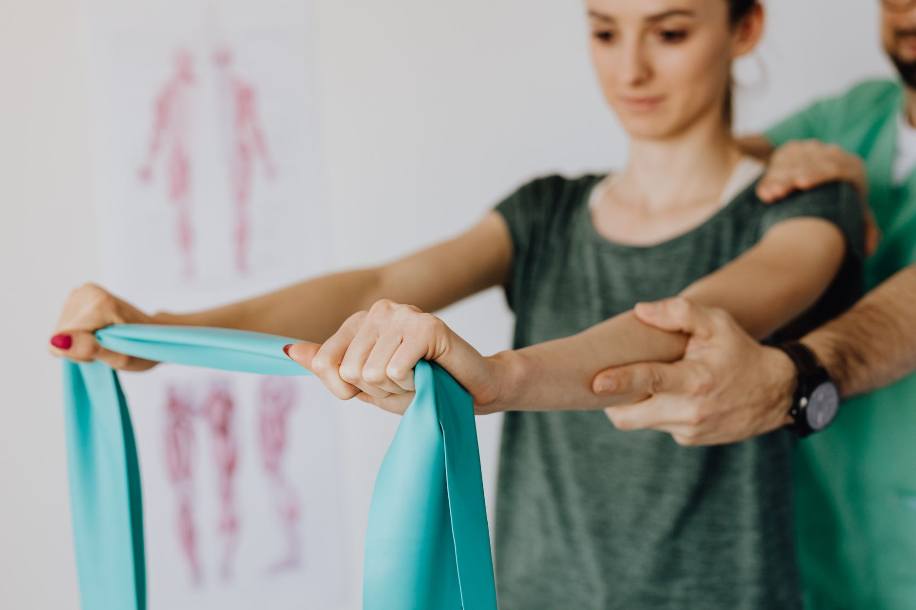 Physical therapist working with a patient in a modern outpatient clinic